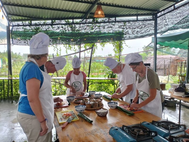 Biking and Cooking Experience in Hoi An - A basket boat through nipa palms