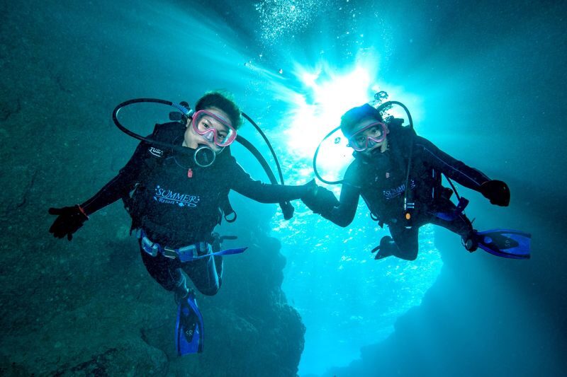 Blue Cave Diving/Snorkeling & Banana Boat Experience in Okinawa - The guide, safety, and photos