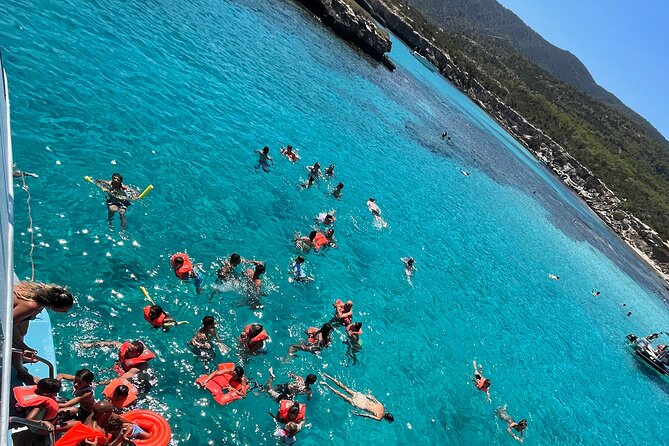 Blue Lagoon Trip With Slide & Music Departing From Latchi Harbour - The Sum Up
