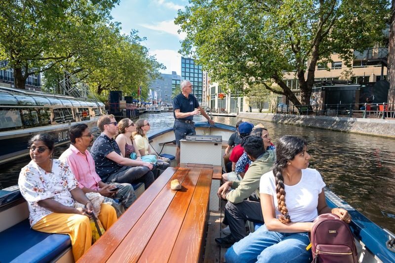 Blue Sky Open Boat Tour in Amsterdam - The captain’s commentary and the city’s details