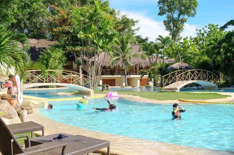 Bluewater Maribago Beach Resort Day or Night Use in Cebu - A small, sheltered beach with changing conditions