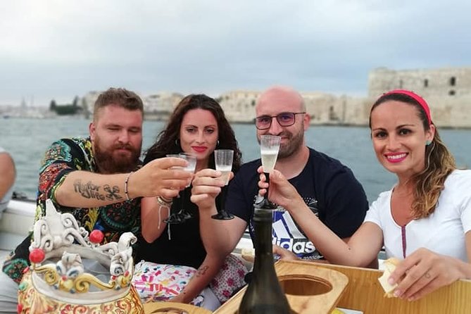 Boat Excursion to the Island of Ortigia and Sea Caves - Activity The Sum Up at Meeting Point