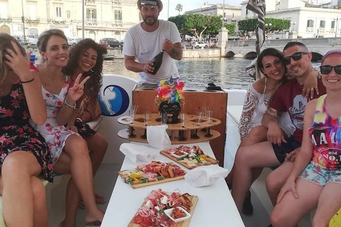 Boat Excursion to the Island of Ortigia and Sea Caves - Common Questions