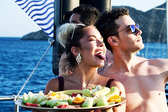 Boat Party With Swimming Stop Experience in Mykonos - Swim off the Shores of Rhenia Island