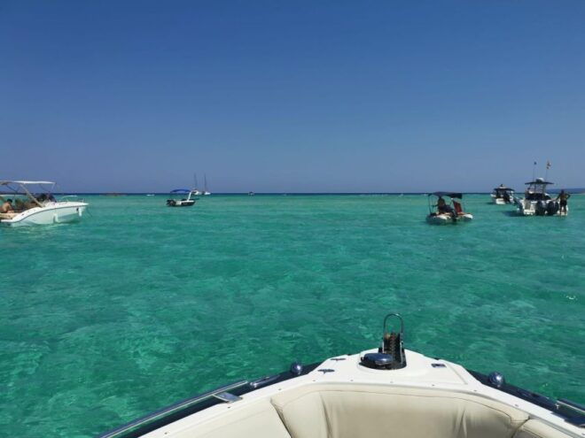 Boat Tour in Ibiza: Sail Through Crystal Clear Waters - Experience Description