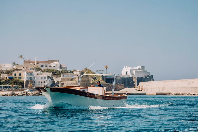 Boat Tour of the Island of Ischia With a Typical Ischia 10-Metre Launch Full Day - Meeting and Pickup