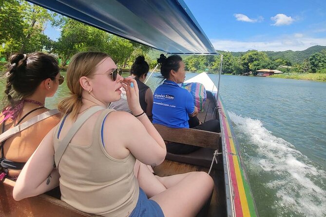 Boat Trip River Kwai and Erawan Falls Full Day Tour From Bangkok - Positive Reviews About Surina as a Tour Guide