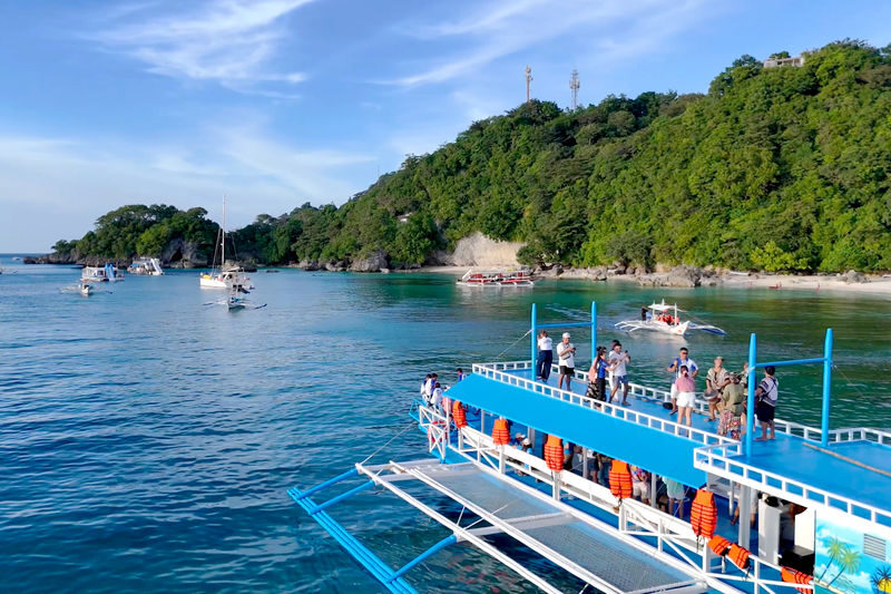 Boracay Island Rhythm Sunset Cruise Experience - This is a floating party, with a Boracay sunset in the background