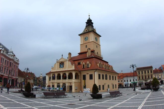 Brasov: Guided City Walking Tour With Wine - Meeting Point and Accessibility
