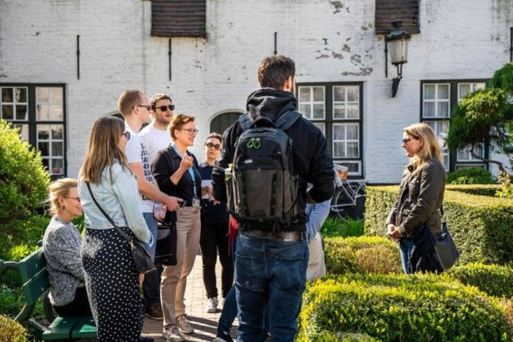 Bruges: Guided Walking Tour With Beer and Waffle - Experience Highlights