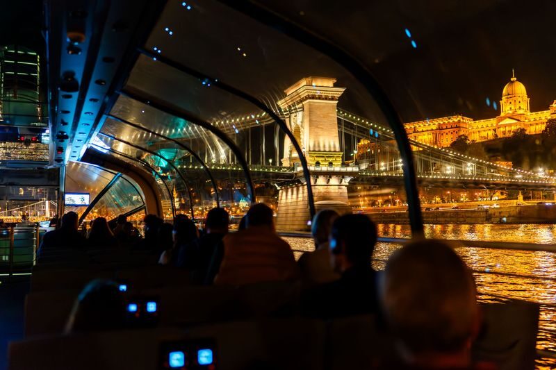 Budapest Evening Cruise with Drink & Audio Guide - The audio guide: useful context, not a live tour