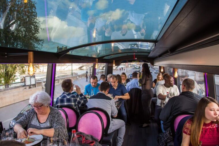 Bus Toqué Champs Elysées Tour W/ 3-Course Dinner & Champagne - Unique Dining Experience