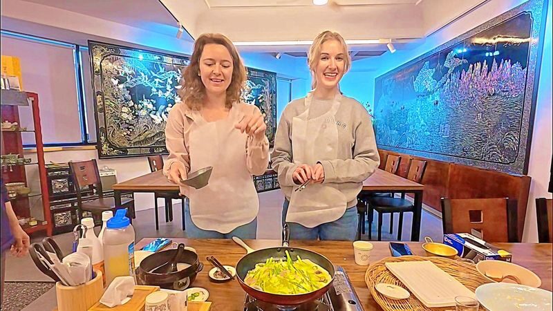 Busan Local Food Experience & Korean Pancake Cooking - Making pajeon, then sitting down to dinner