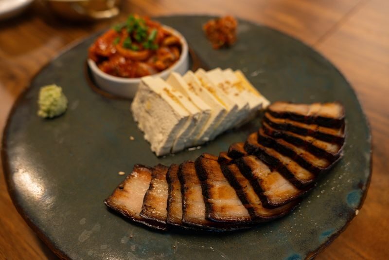 Busan Local Food Experience & Korean Pancake Cooking - Korean games and an unhurried finish