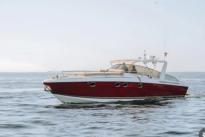 Cabo San Lucas Luxury Yacht to El Arco with Snorkeling Stop - Relaxing on Deck with Drinks