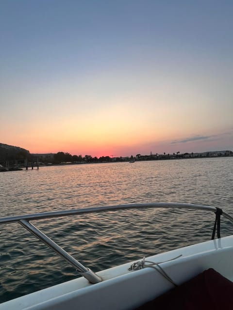 Cagliari: Sunset Aperiboat in the Angels Gulf - Highlights of the Sunset Tour