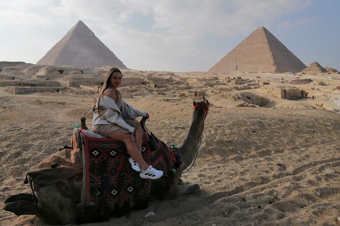 Cairo Layover Tour Giza Pyramids Egyptian Museum Local Bazaars Camel Ride Lunch - Exploring the Giza Pyramids