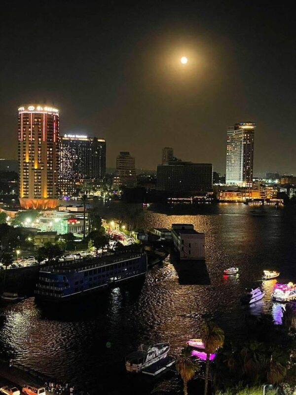 Cairo Nile Sunset Felucca & Khan El Khalili Night Tour - Downtown shows a different Cairo