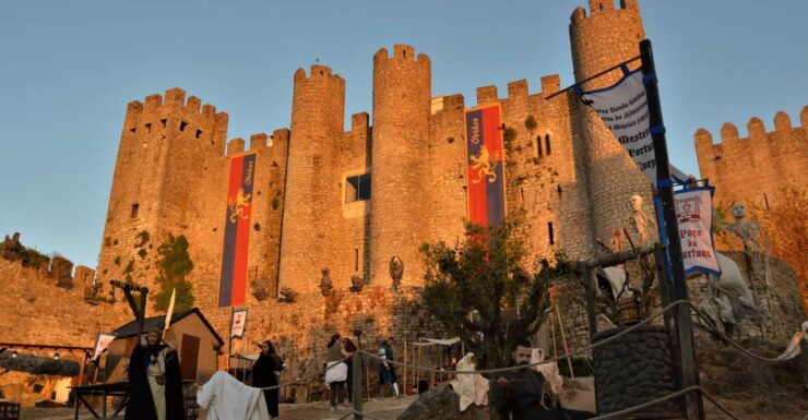 Caldas Da Rainha: Obidos Medieval Village & Buddha Eden Tour - Location & Historical Activities