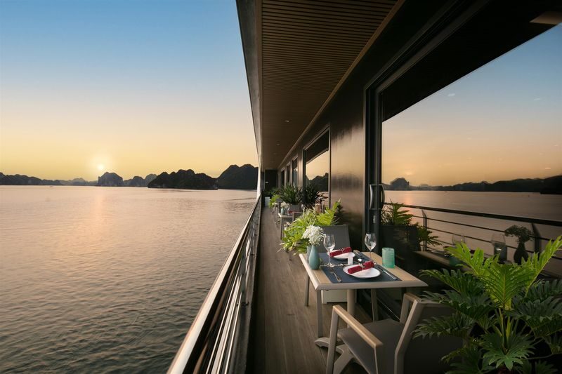 Calista 2D1N Cruise: Ha Long Bay, Sung Sot, Ti Top, Tung Sau - Sunset and evening: poolside views, spring rolls, and squid fishing
