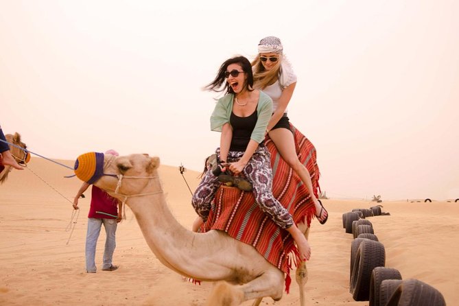 Camel Ride in Desert With Dune Bashing, BBQ Dinner and Belly Dance - Desert Adventure: Camel Ride and Dune Bashing