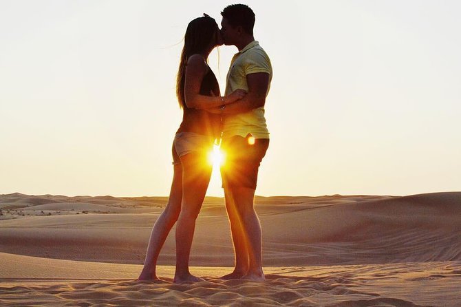 Camel Rock Desert Safari Dubai With Bbq Dinner Camel Ride Sand Boarding & More - Pricing and Booking Details