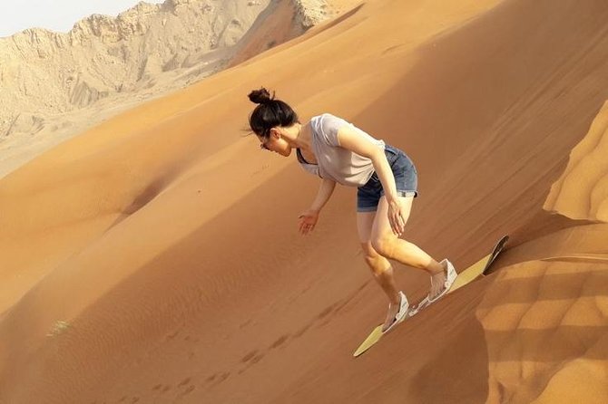 Camel Rock Desert Safari Dubai With Bbq Dinner Camel Ride Sand Boarding & More - Common Questions