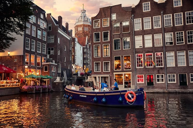 Canal Booze Cruise with Unlimited Drinks Option in Amsterdam - A Social Cruise, Not a Quiet History Lecture