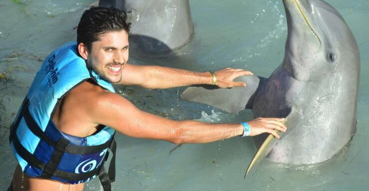 Cancun: Dolphin Encounter on Isla Mujeres and Garrafon Park - Experience Highlights