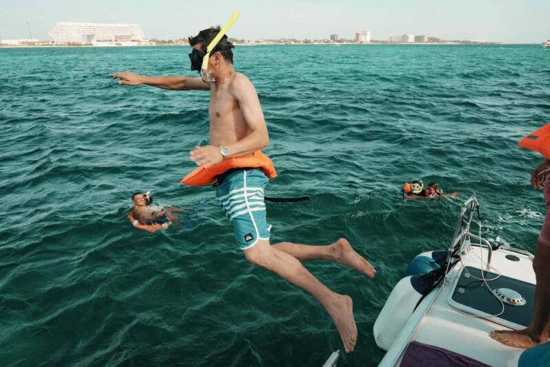 Cancun: Isla Mujeres Adults Only Party Catamaran with Drinks - The Experience in Detail