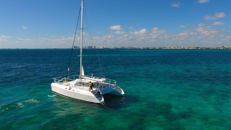 Cancún: Isla Mujeres Catamaran Tour & Swim With Dolphins - Booking Details