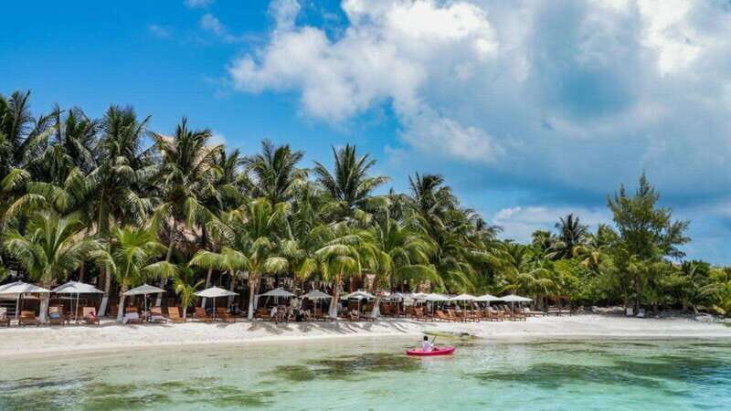 Cancun: Isla Mujeres Catamaran Tour with Open Bar of Drinks - The Sum Up