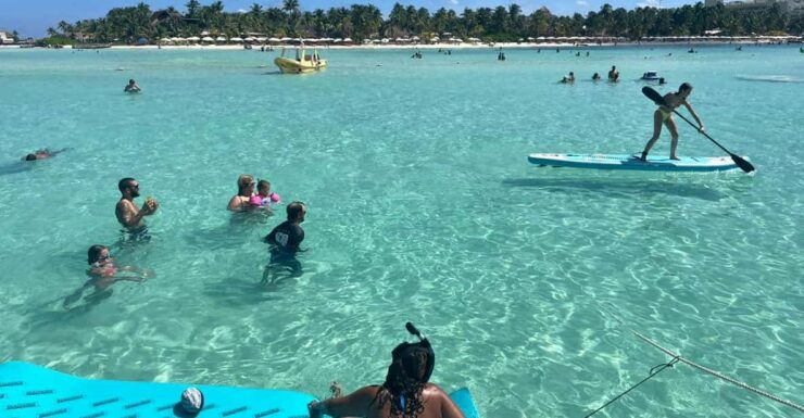 Cancun: Waterslide Party Boat Adventure to Isla Mujeres - Experience Highlights