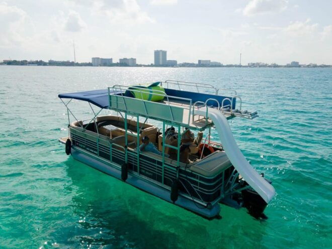 Cancun: Waterslide Party Boat Adventure to Isla Mujeres - Meeting Point and Language