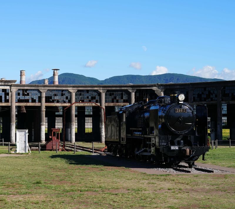Cantonese, Mandarin, and English tour guide, Attack on Titan/Oyama Dam bronze statue & Hita Station/Mameda-machi nostalgic old town & Yufuin/Yunotsubo Street + Kinrin Lake & Former Bungo Mori Roundhouse Anime Spot Day Tour - From Fukuoka to Hita, a day built around anime