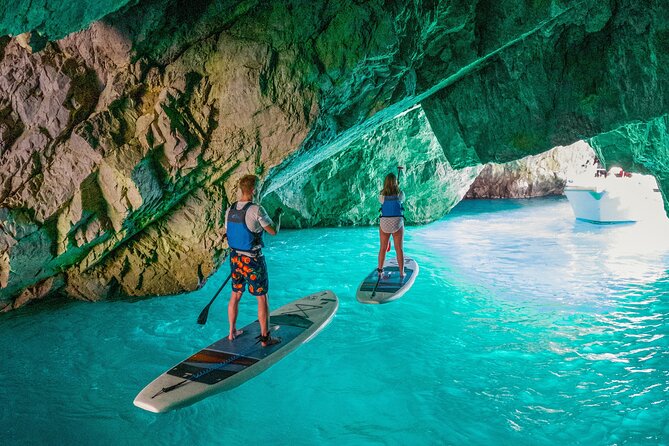 Capri: Faraglioni Rocks and Blue Grotto Paddleboarding Tour - Instructor and Equipment Details