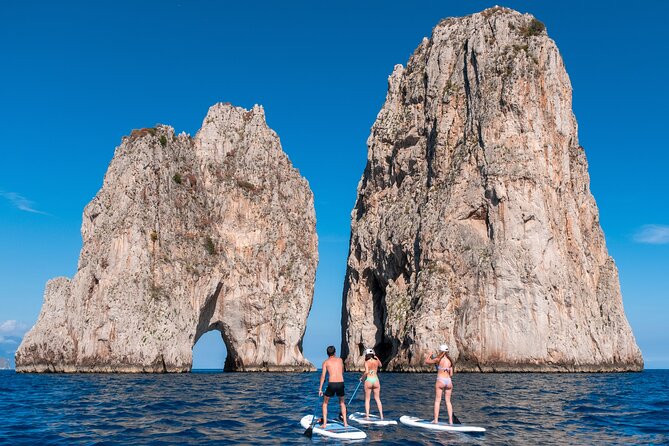 Capri: Faraglioni Rocks and Blue Grotto Paddleboarding Tour - Special Offer and Pricing