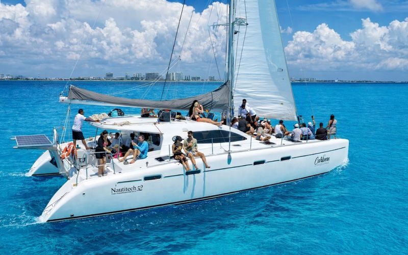 Catamaran Experience with Snorkeling, Buffet Lunch & Drinks - A Cancún sailing day with three different stops