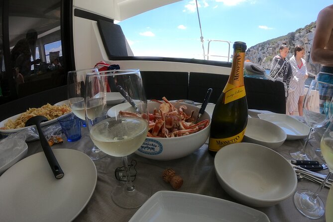 Catamaran in Alghero, Daily Boat Trip - Pricing and Terms for the Catamaran Trip