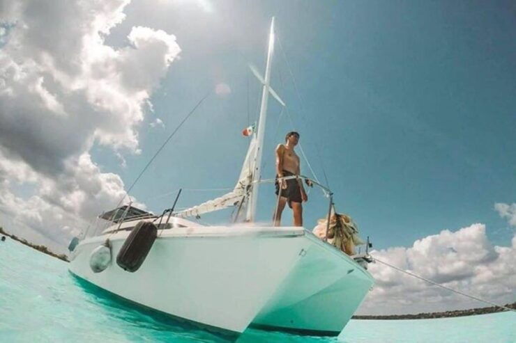 Catamaran Party Isla Mujeres With Drinks & Lunch - Experience Highlights