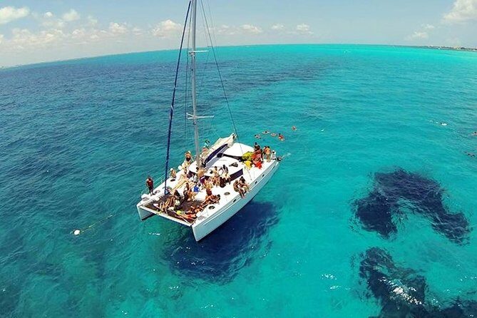 Catamaran Party on the Caribbean Sea to Isla Mujeres - Who Will Love This Tour?