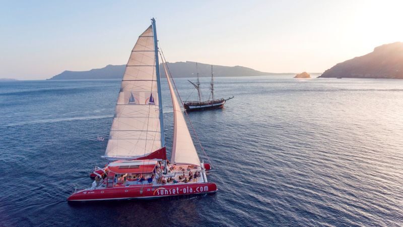 Catamaran red cruise experience with meal in Santorini - At a glance