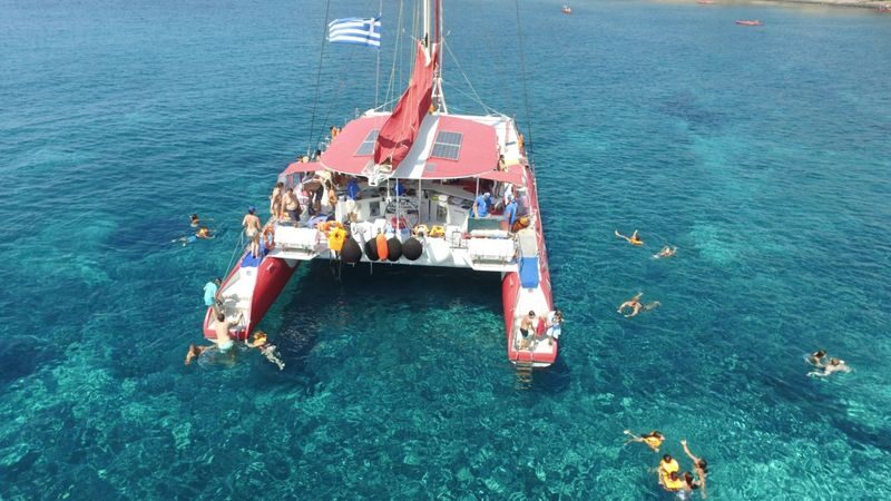 Catamaran red cruise experience with meal in Santorini - A Greek meal, with drinks included
