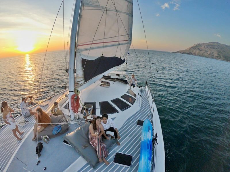 Catamaran Sail to Coral Island & Sunset Dinner Cruise - From Phuket hotel pickup to Chalong Pier
