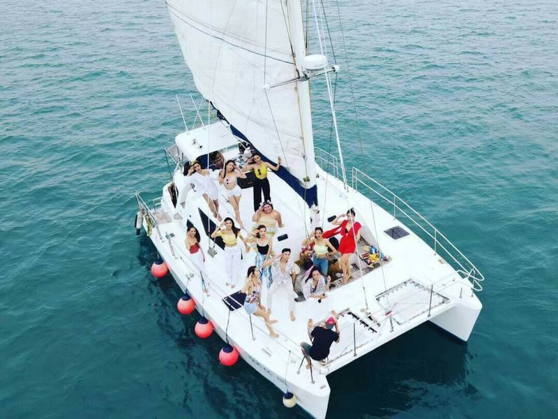Catamaran Sail to Coral Island & Sunset Dinner Cruise - The catamaran ride and the snorkeling stop