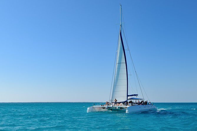 Catamaran Sailing to isla mujeres open bar included - Discover the Magic of Cancun’s Catamaran Sailing to Isla Mujeres