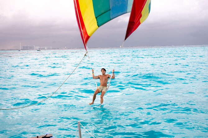 Catamaran to Isla Mujeres, Open Bar, Buffet, Beach Club Included - Exclusive Beach Club Access