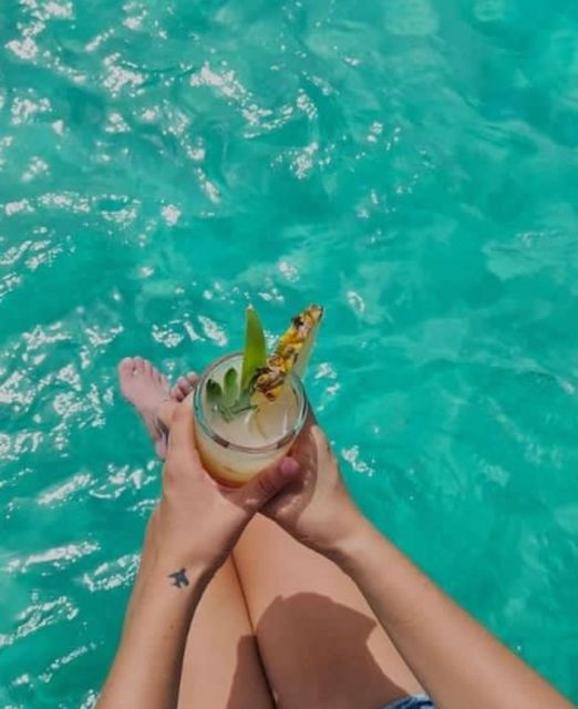 Catamaran to Isla Mujeres Open Bar - Experience Highlights