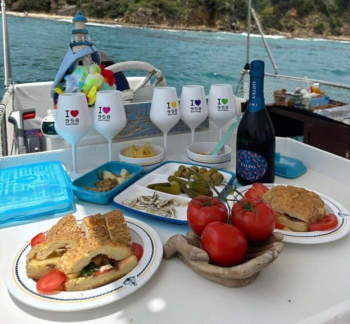 Catamaran tour along the Cefalù coast with aperitif and snorkeling - Good To Know
