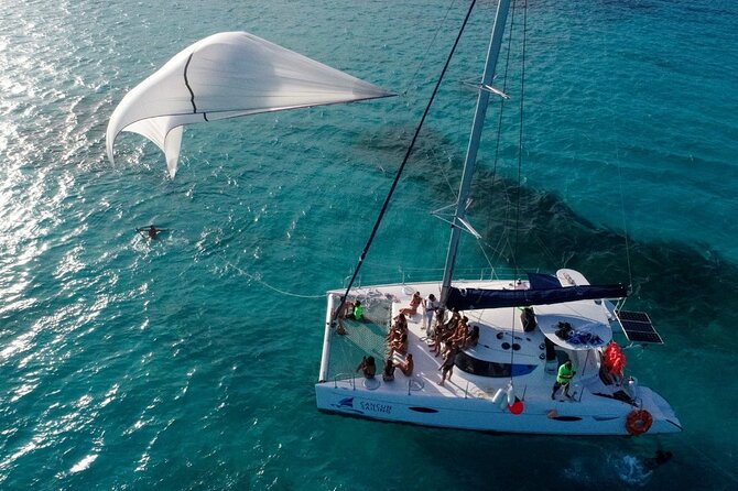 Catamaran Tour to Isla Mujeres, Open Bar, Lunch, Snorkeling, Beach Club Included - Snorkeling Adventure